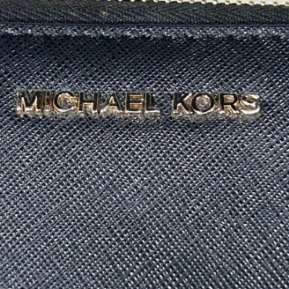 > Michael Kors Black Saffiano Leather Wristlet